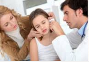 doctor examining child of Naveen ENT Hospital