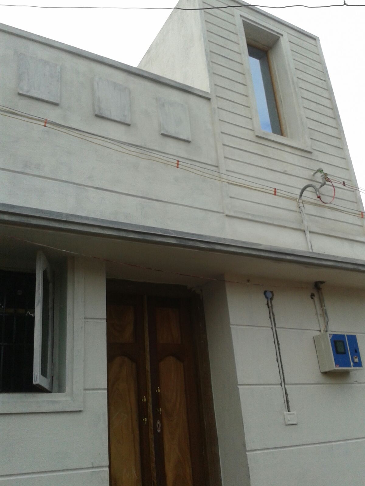 Modern Elevation of K Builder and Contractors and Traders