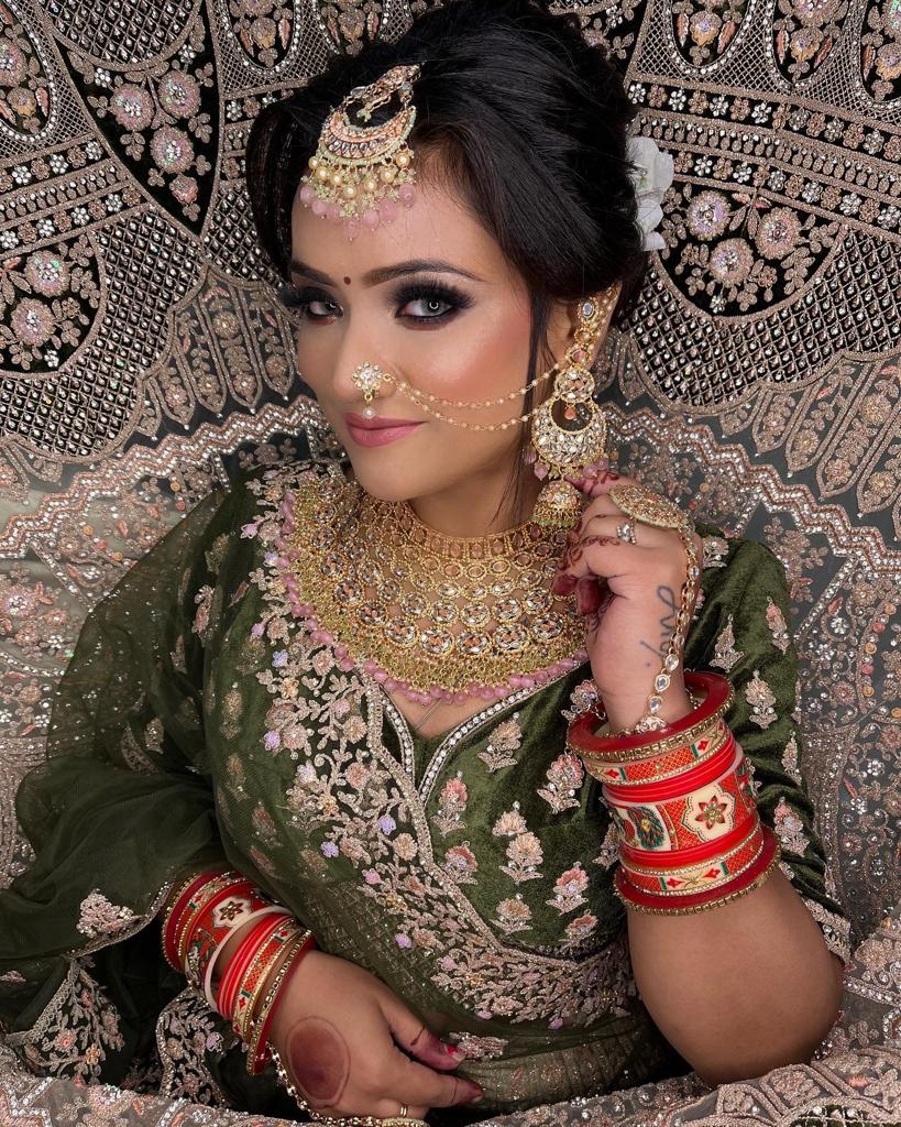 traditional wedding attire of Noormakeover By Meenu Madaan